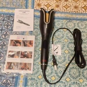 CHI spin/curl ceramic rotating curler, blk, auto shut off, new w/o box.